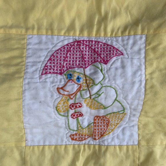 Vintage baby quilt with cross-stitch ducks in many activities. - Picture 2 of 9